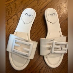Well worn fendi flip flops
